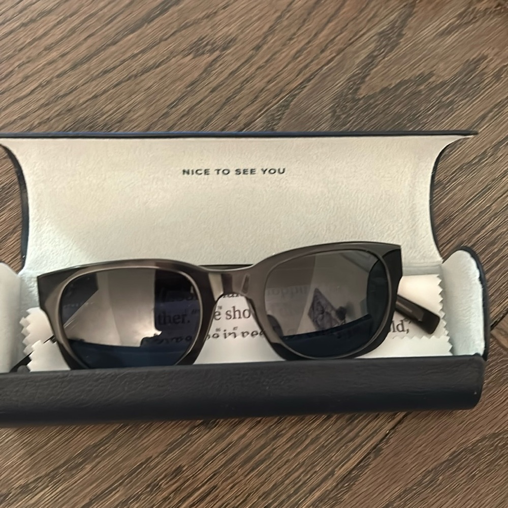 Never worn brand new Warby Parker black frame sunglasses